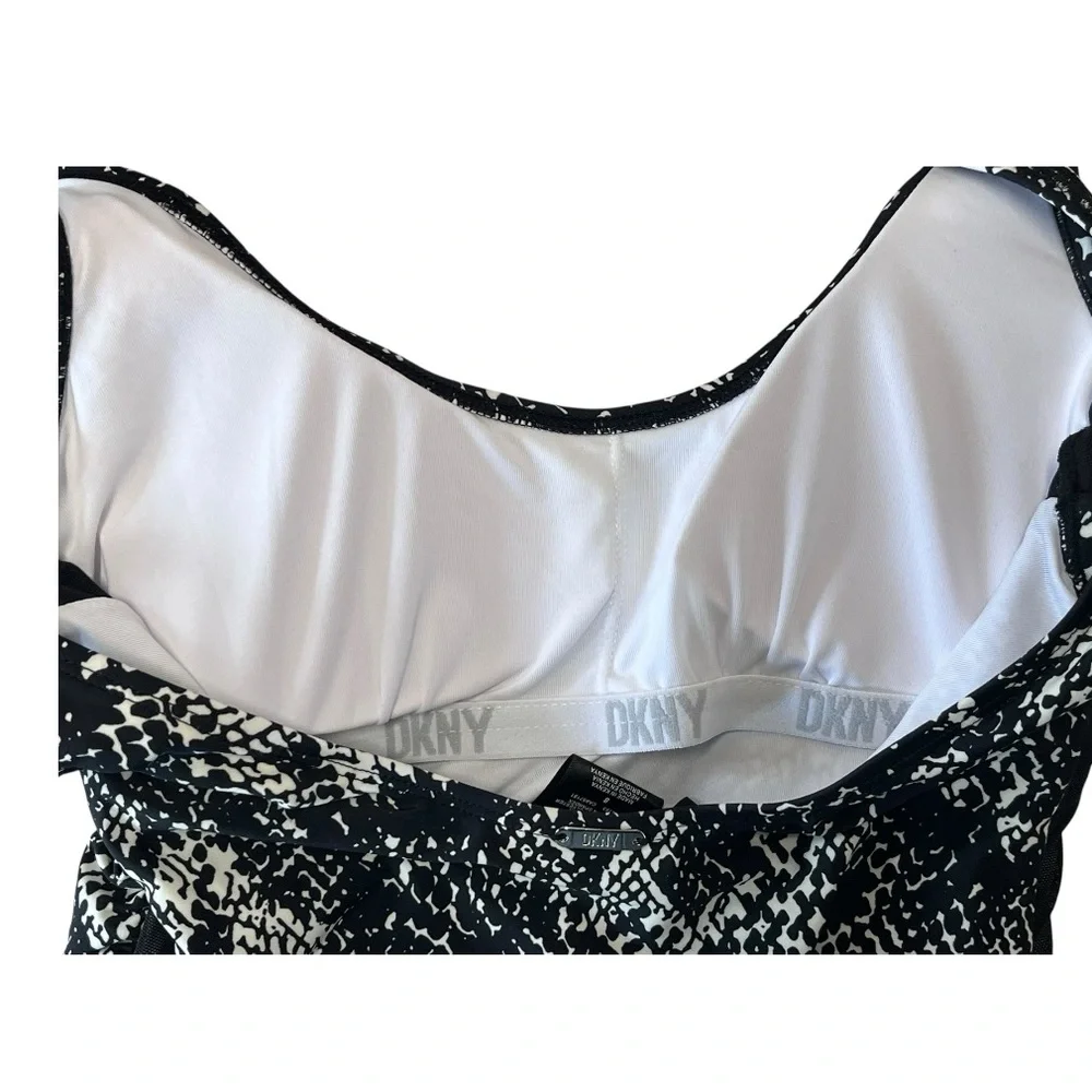NWT DKNY | Mesh Side Inserts Ruched Waist One Piece
Swimsuit Size 8 - Picture 6 of 11
